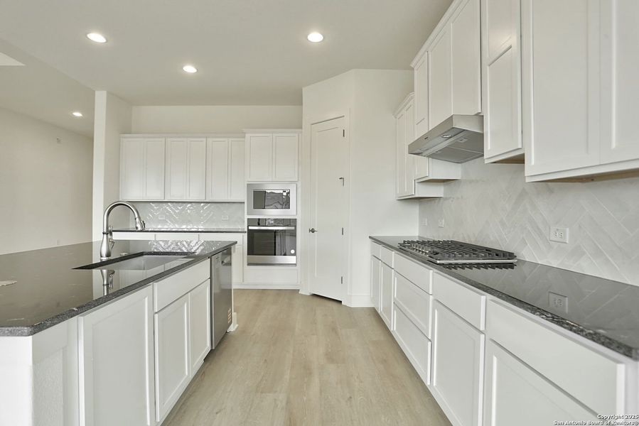 Furnished interior view inside a new home in Kinder Ranch 70's, San Antonio (Image 9). Furnished interior view inside a new home in Kinder Ranch 70's, San Antonio (Image 9).