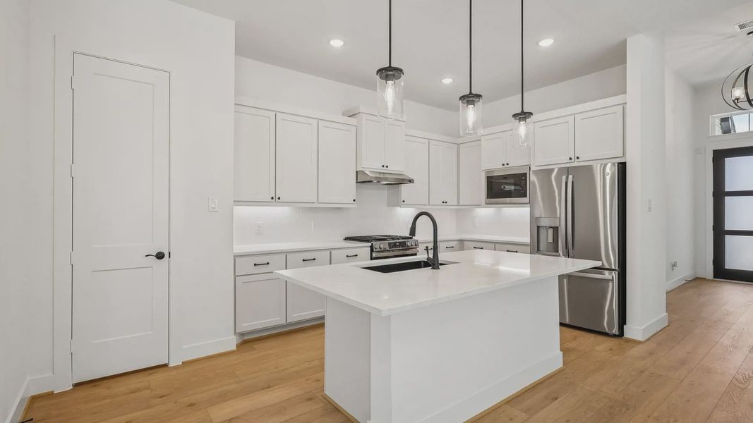 Representative furnished interior of a home built from the Oxford by Chesmar Homes in Parkside on the River, Georgetown (Image 8).