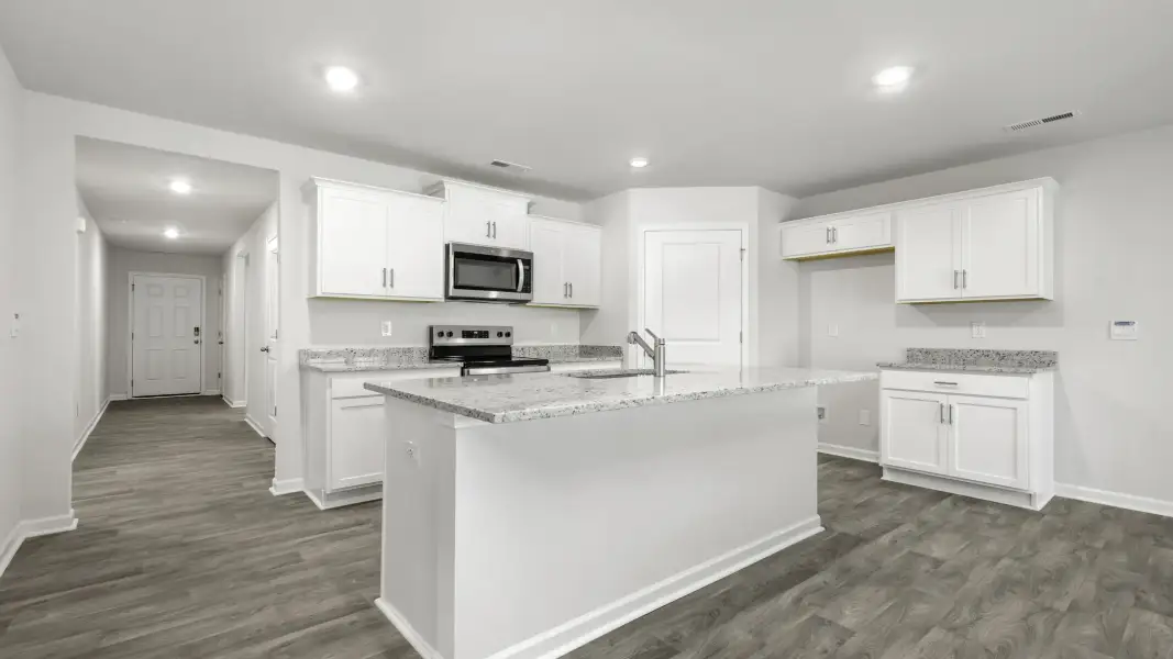 Furnished interior view inside a new home in Madison Gardens, Lexington (Image 5).