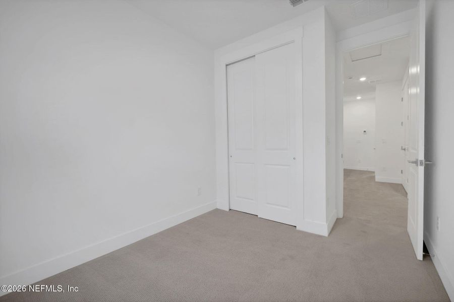 Spacious, unfurnished interior of a new home in North Beach Townhomes, Jacksonville Beach (Image 24).