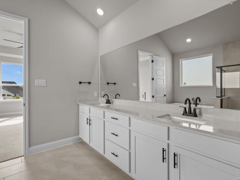 Furnished interior view inside a new home in Potranco Oaks, Castroville (Image 14).