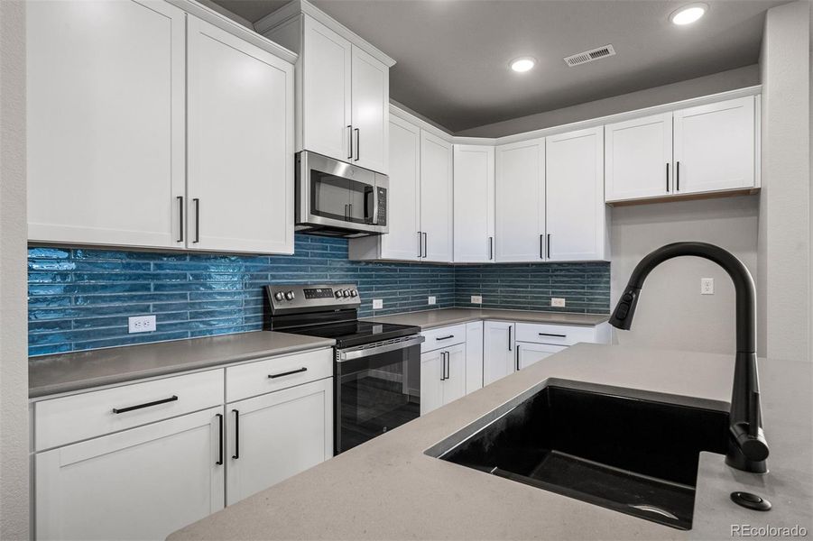 Close-up of interior finishes inside a home in Revel Crossing at Wolf Ranch – The Ascent Collection, Colorado Springs (Image 14).
