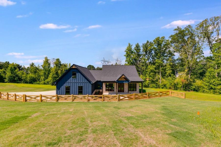 Front exterior of a new home in , Dallas, GA, highlighting curb appeal (Image 1).