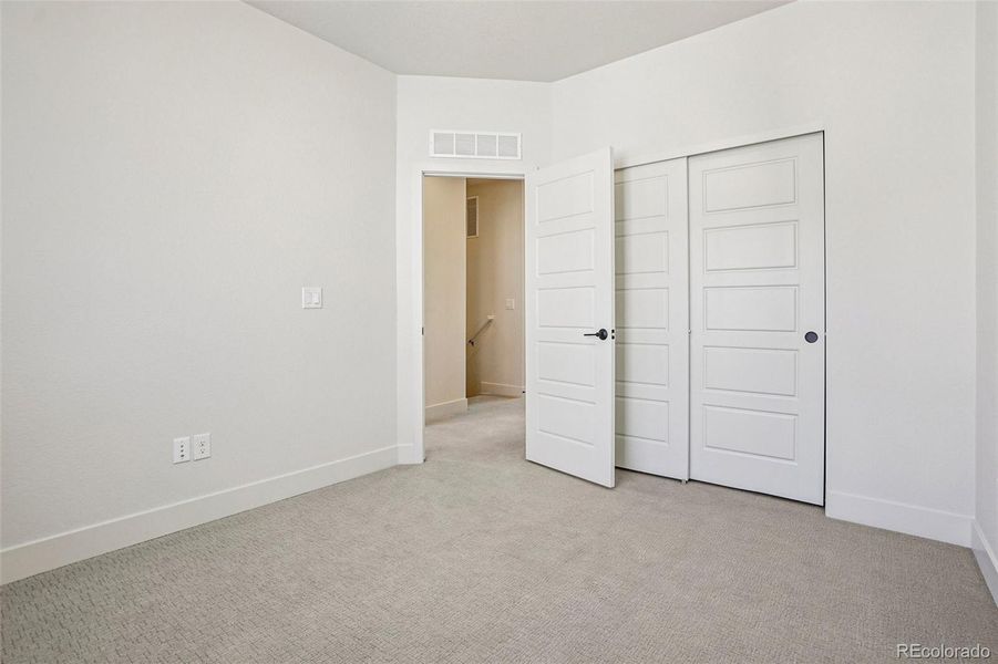 Spacious, unfurnished interior of a new home in Loretto Heights - Rise Collection, Denver (Image 18).