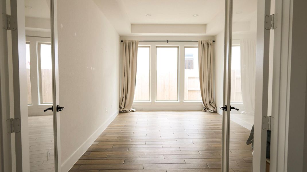 Floor-to-ceiling windows illuminate this spacious, versatile room, perfect for any need. Floor-to-ceiling windows illuminate this spacious, versatile room, perfect for any need.