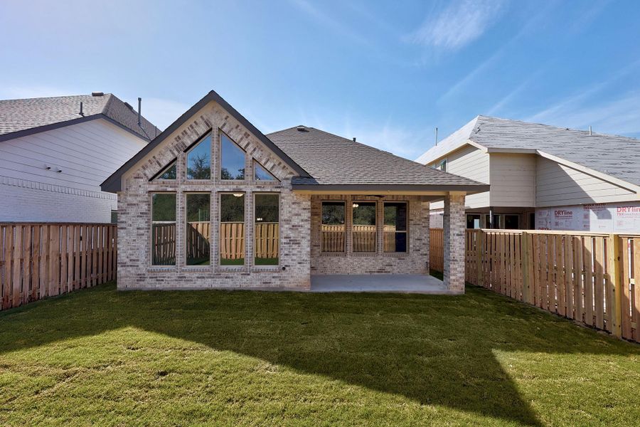 Exterior details and patio area of a home in Parmer Ranch, Georgetown (Image 20).