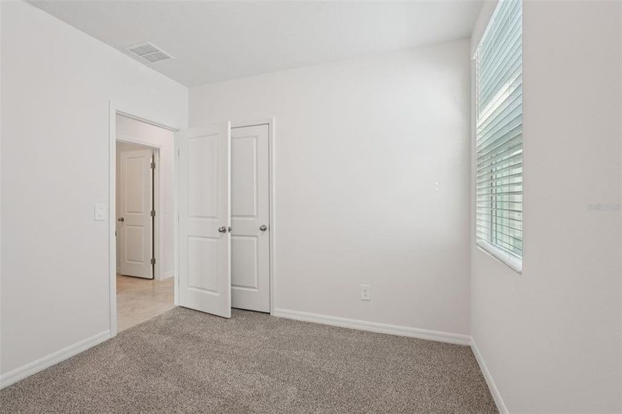 Spacious, unfurnished interior of a new home in Crosswinds - Classic Series, Haines City (Image 15).