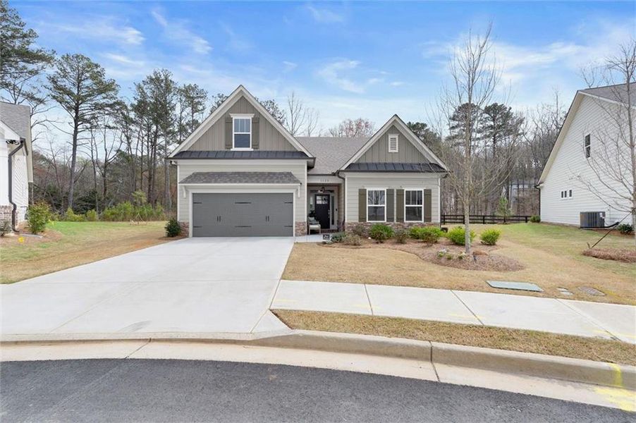 Front exterior of a new home in , Woodstock, GA, highlighting curb appeal (Image 23).