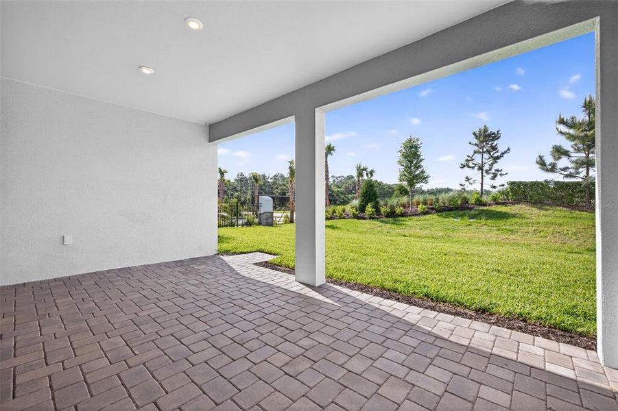 Exterior details and patio area of a home in Windwater, Parrish (Image 3).