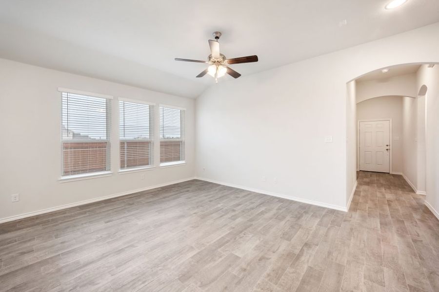 Representative exterior photo of a completed home built from the Joliet by Impression Homes in Heartland, Heartland, TX (Image 11).