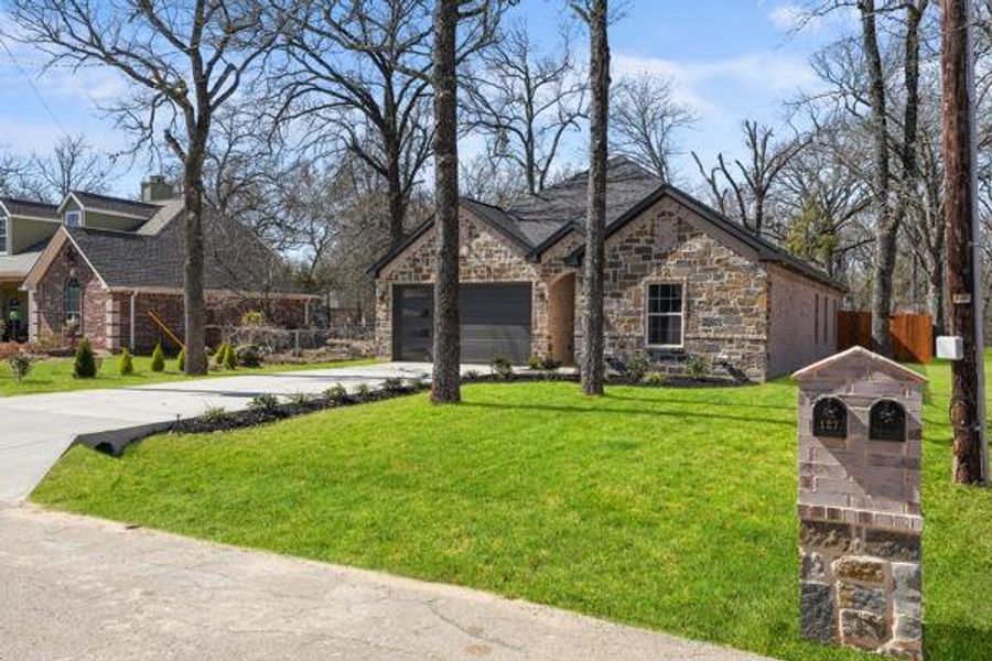 Front exterior of a new home in , Trinidad, TX, highlighting curb appeal (Image 1). Front exterior of a new home in , Trinidad, TX, highlighting curb appeal (Image 1).