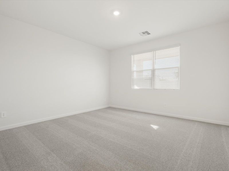 Spacious, unfurnished interior of a new home in White Tank Foothills Signature Series, Waddell (Image 10).