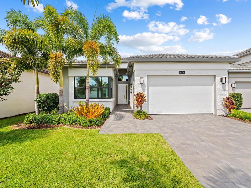Front exterior of a new home in , Boynton Beach, FL, highlighting curb appeal (Image 18).