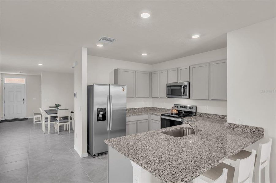 Furnished interior view inside a new home in Star Farms at Lakewood Ranch, Bradenton (Image 13).