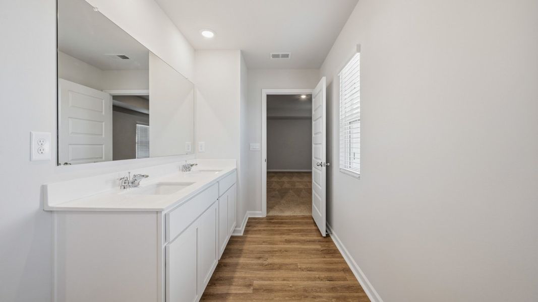 Furnished interior view inside a new home in The Reserve at Calcutta, Stockbridge (Image 12).