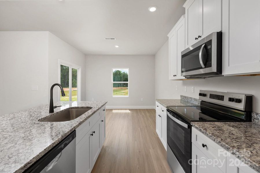 Furnished interior view inside a new home in Ascot Woods, Charlotte (Image 5).