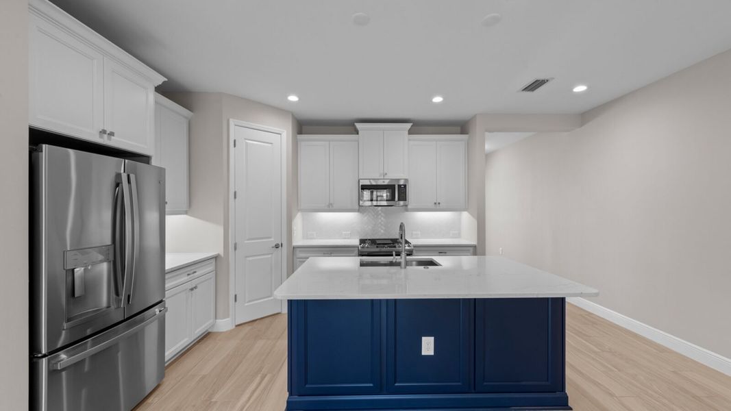 Furnished interior view inside a new home in SkySail, Naples (Image 7).