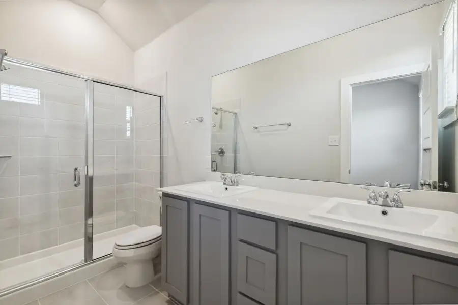 Primary Bathroom in the Ash home plan by Trophy Signature Homes – REPRESENTATIVE PHOTO Primary Bathroom in the Ash home plan by Trophy Signature Homes – REPRESENTATIVE PHOTO