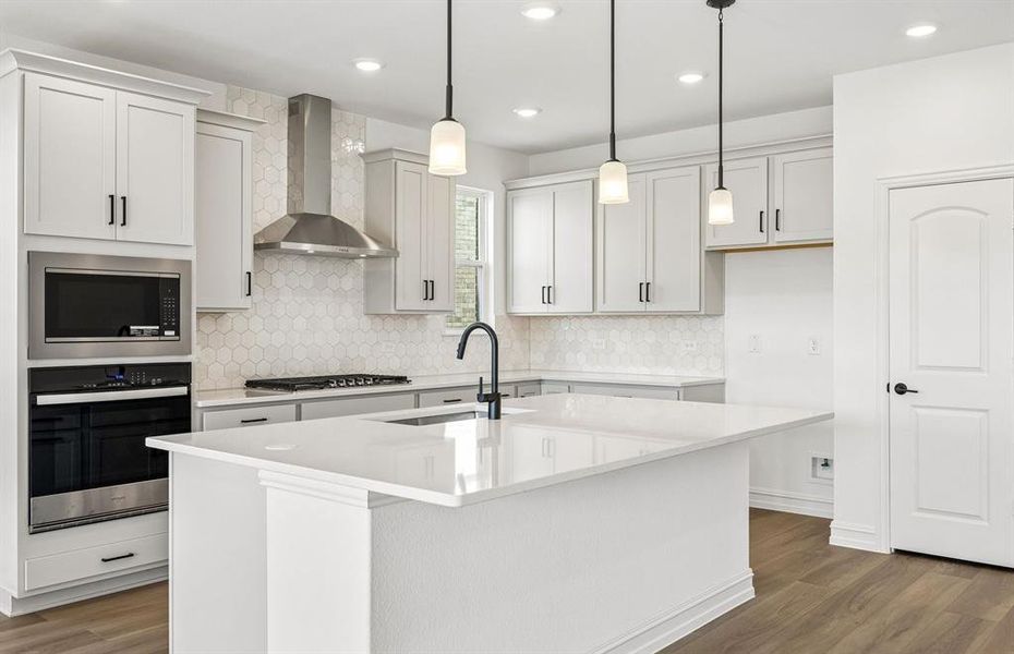 Kitchen with eat-in bartop island