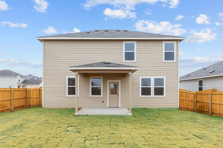 A house with a fence around it.