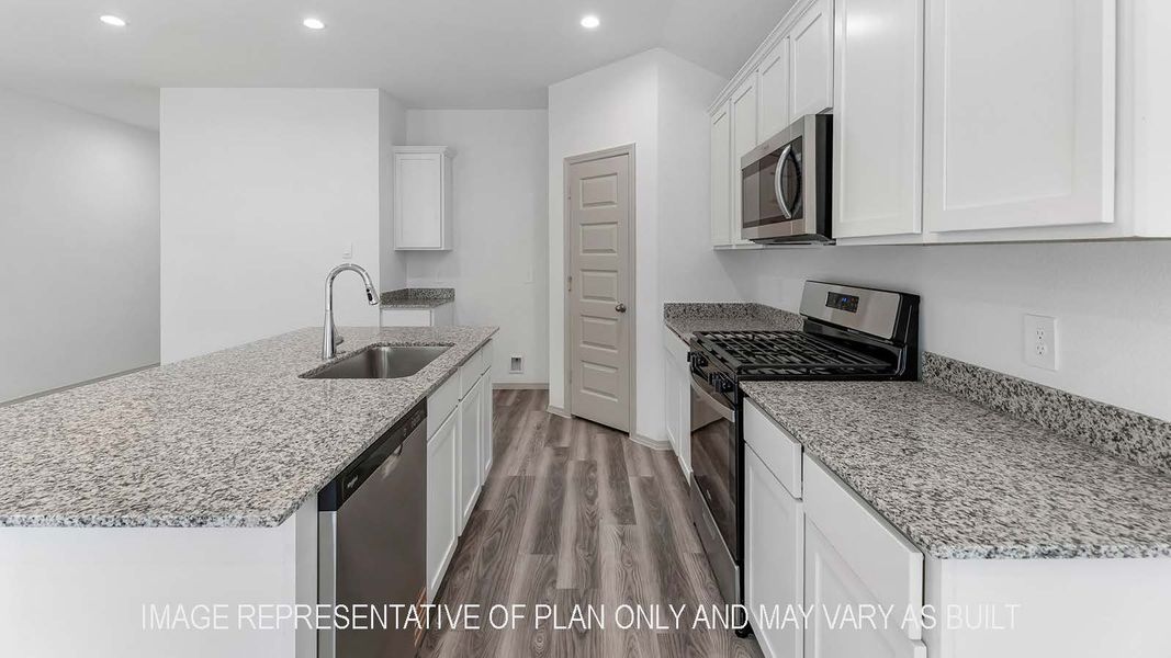 Furnished interior view inside a new home in Reserve at Mallard Lakes, Orange (Image 6).