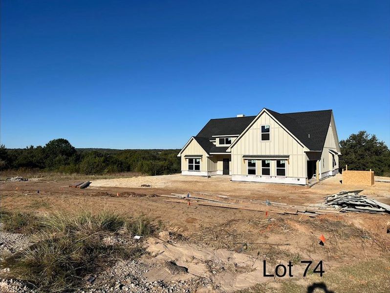 View of front of home featuring board and batten siding