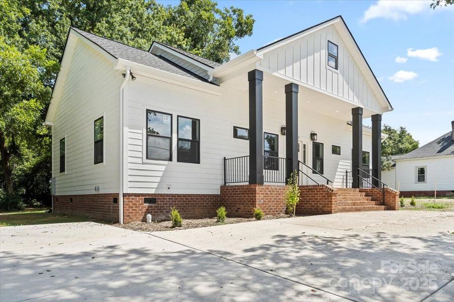 Front exterior of a new home in , Rock Hill, SC, highlighting curb appeal (Image 1). Front exterior of a new home in , Rock Hill, SC, highlighting curb appeal (Image 1).