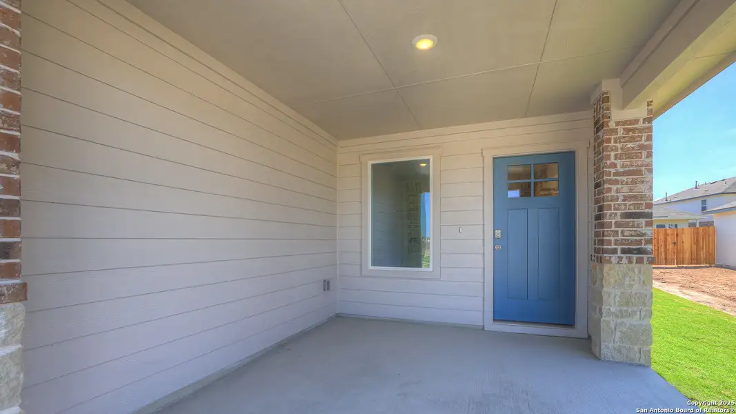 Exterior details and patio area of a home in Whisper South, San Marcos (Image 2). Exterior details and patio area of a home in Whisper South, San Marcos (Image 2).