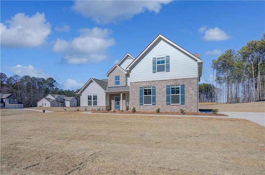 Exterior details and patio area of a home in Riverbend Overlook, Fayetteville (Image 20).