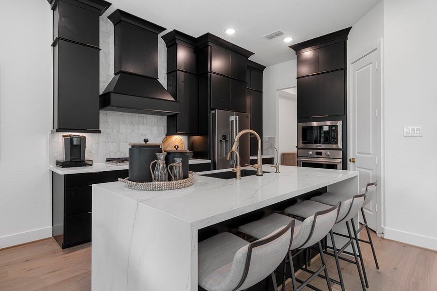 Furnished interior view inside a new home in The Highlands 50', Porter (Image 14).