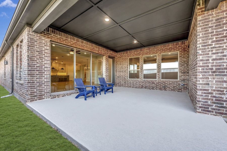 Exterior details and patio area of a home in Elements at Viridian - Traditional Series, Arlington (Image 3). Exterior details and patio area of a home in Elements at Viridian - Traditional Series, Arlington (Image 3).