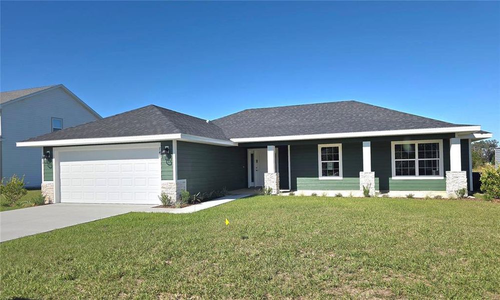 Front exterior of a new home in The Preserve at Laurel Lake, Lake City, FL, highlighting curb appeal (Image 25).