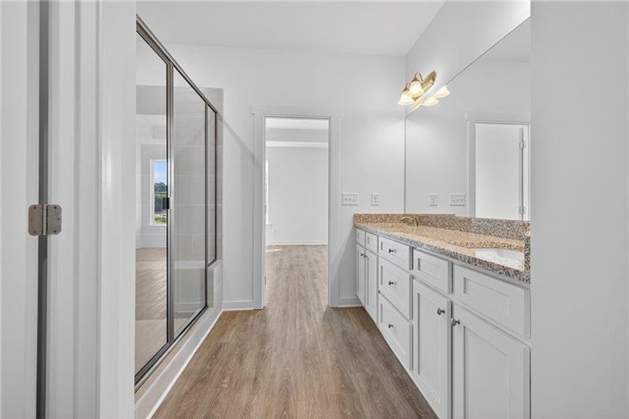 Furnished interior view inside a new home in Sutton's Landing, Statham (Image 11).