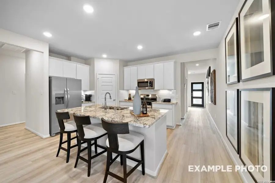 Furnished interior view inside a new home in Agave, San Antonio (Image 30).