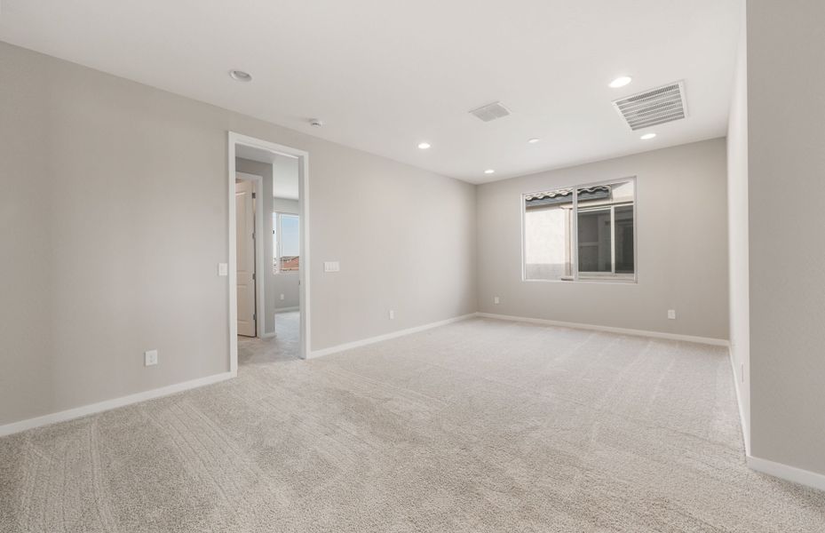Spacious, unfurnished interior of a new home in Legado West, Queen Creek (Image 18).