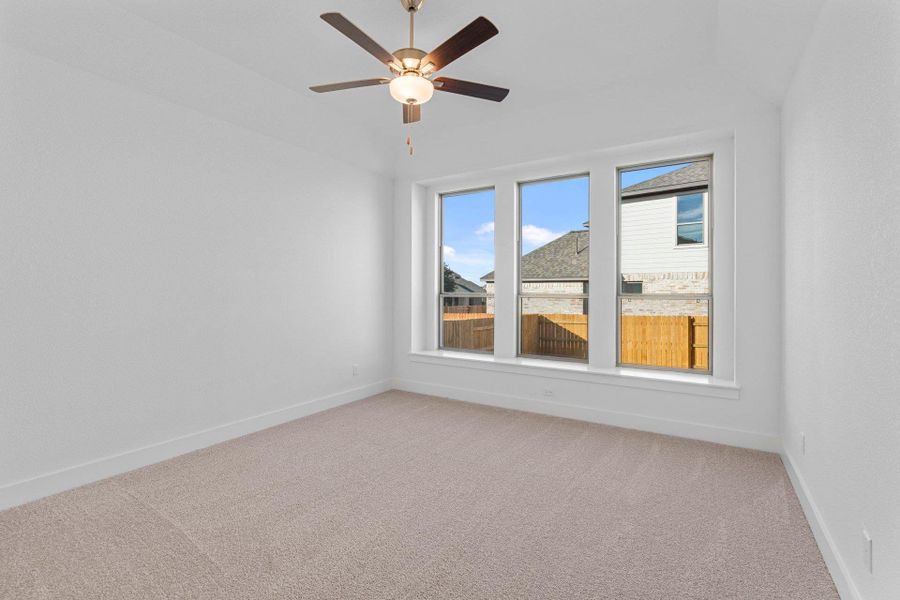 Primary Bedroom with elevated ceiling