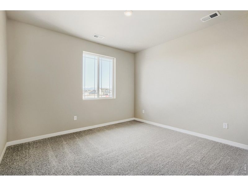 Spacious, unfurnished interior of a new home in Farmstead, Berthoud (Image 22).