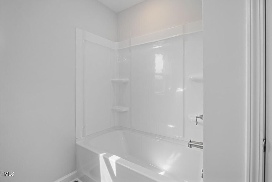 Furnished interior view inside a new home in Woodland Crossing, Zebulon (Image 12).