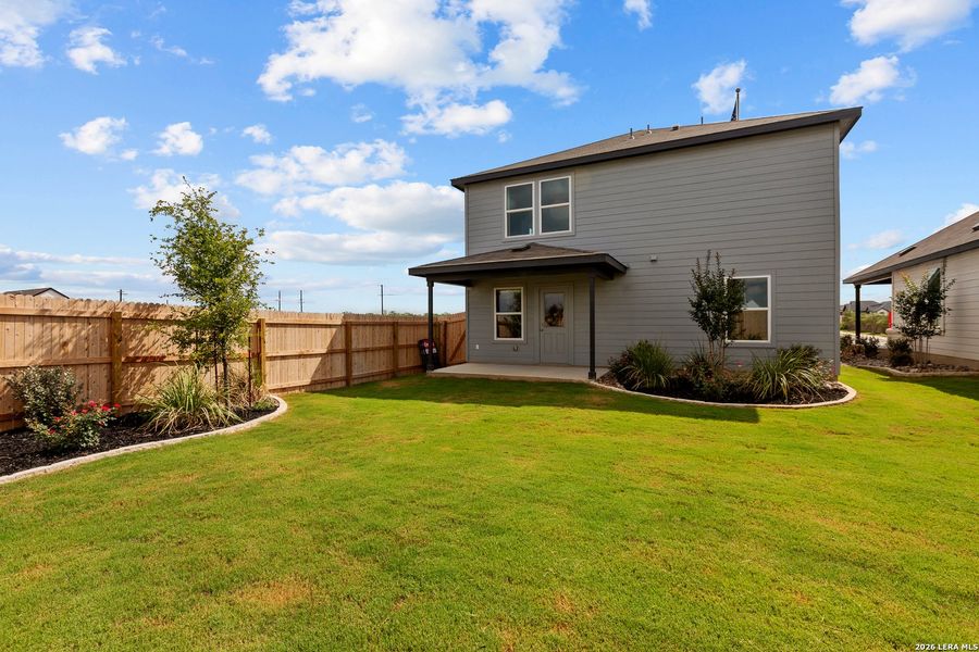 Exterior details and patio area of a home in Dove Song, Marion (Image 3).