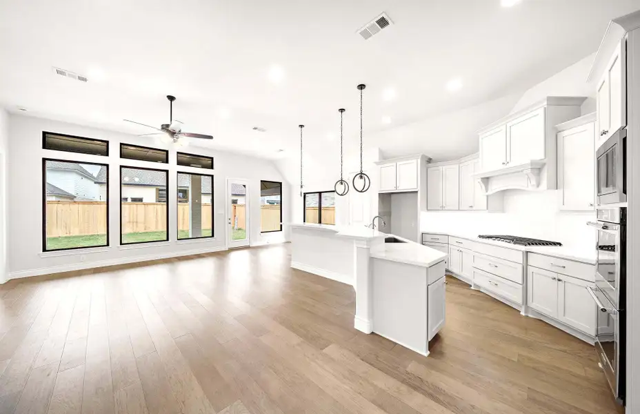 Furnished interior view inside a new home in Bridgeland 50′, Cypress (Image 4).