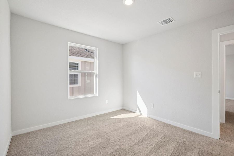 Spacious, unfurnished interior of a new home in Avery Centre, Round Rock (Image 16).