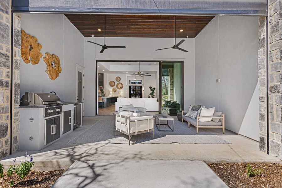 Exterior details and patio area of a home in Belle Oaks, Bulverde (Image 26).