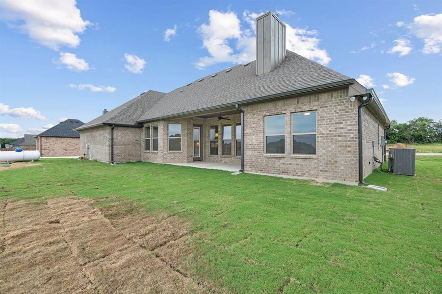 Front exterior of a new home in , Paradise, TX, highlighting curb appeal (Image 14).