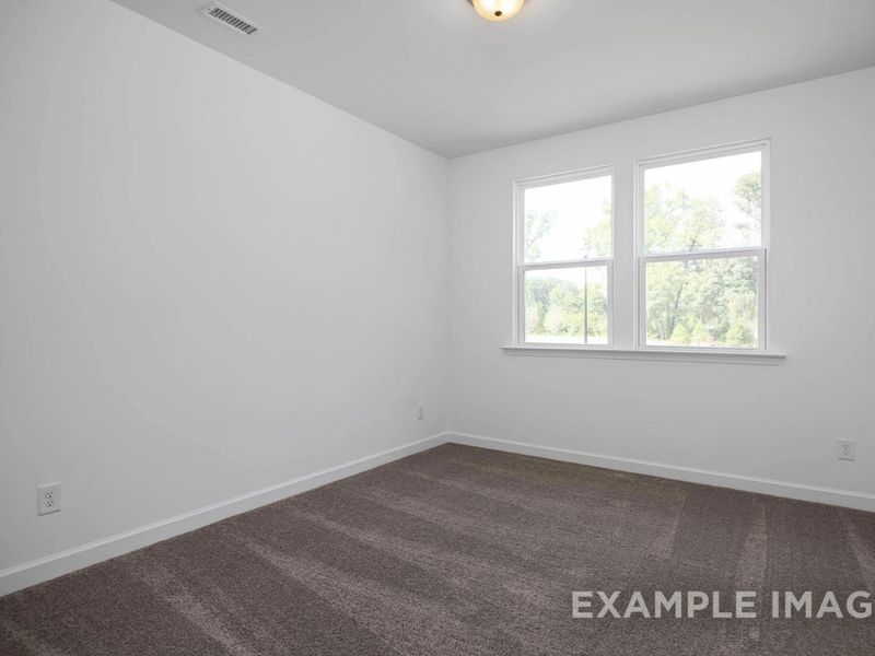 Spacious, unfurnished interior of a new home in Woodland Crossing, Zebulon (Image 17).