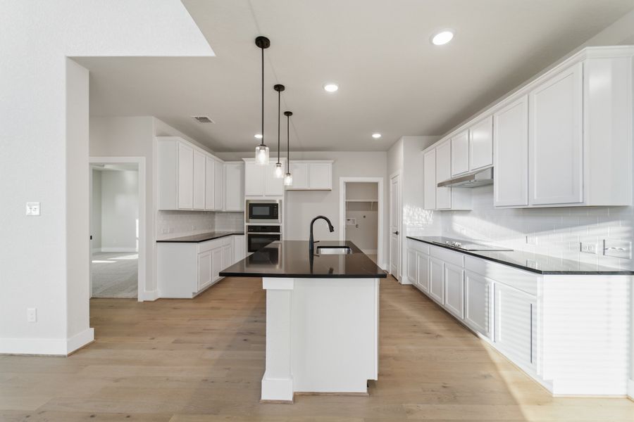 Furnished interior view inside a new home in The Woodlands at Medina Hills, Mico (Image 9).