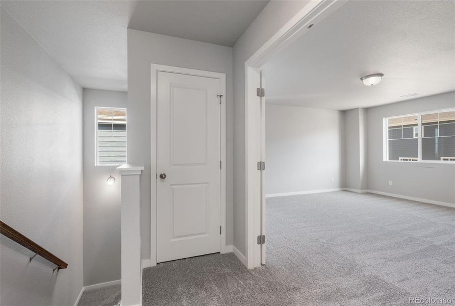 Spacious, unfurnished interior of a new home in Sky Ranch – Uptown Collection, Watkins (Image 19).