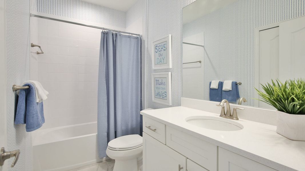 Furnished interior view inside a new home in Palm Grove Real Estate and Homes for Sale in Lakewood Ranch, FL - Neal Communities, Lakewood Ranch (Image 54).
