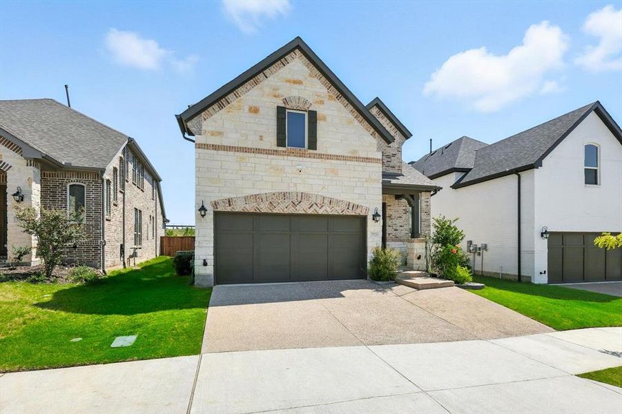 Front exterior of a new home in , Lewisville, TX, highlighting curb appeal (Image 23). Front exterior of a new home in , Lewisville, TX, highlighting curb appeal (Image 23).