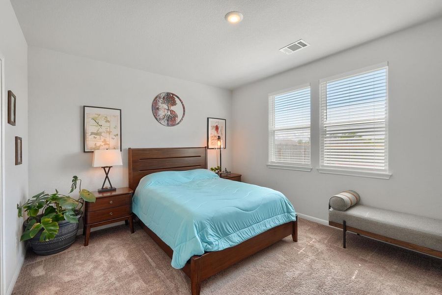 Furnished interior view inside a new home in Stallion Run, Buda (Image 9).