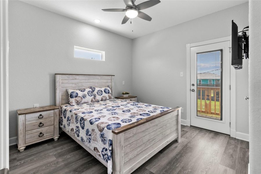 Downstairs Bedroom w/Rear Balcony Access